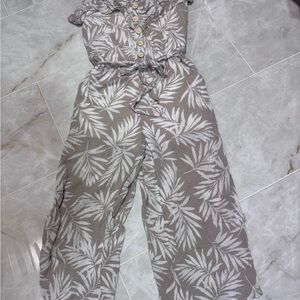 Women's Leaf Print Jumpsuit - tan and cream colored.
